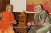 Pejawar Seer meets Modi; appeals against setting up industries on farm lands